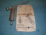 Vintage Lincoln Grease Gun Model 700239. Fixed Price $50.00.