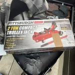 Pittsburgh Automotive 2-TON Compact Trolley Jack Red #64874. Fixed Price $107.57.