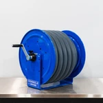 Cox Vacuum Hose Reel Blue Hand Crank Includes 50'. Fixed Price $539.00.