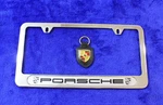 Stainless Porsche License Plate Frame With Crests Accessory And Leather Fob. Fixed Price $39.95.