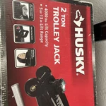 Husky 2-TON Hydraulic Trolley Floor Jack, Lifting Range Of 5 In. 13. Fixed Price $60.00.