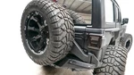 Fab Fours 3/16" Steel Black Powder Coat Tire Carrier For 18-20 Wrangler Jl. Fixed Price $2459.99.