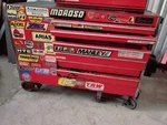 Red Snap On Tool Box Chest & Roller Cabinet 50''X27''X40"; 13 Drawers Sides. Fixed Price $850.00.