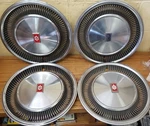 1977 - 1979 Oldsmobile Ninety Eight 15 " Wheel Covers Hubcaps 4051 Set Of Nos. Fixed Price $225.00.