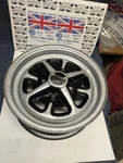 Mgb Ro-style Road Wheel, 1970-80.. Fixed Price $149.95.